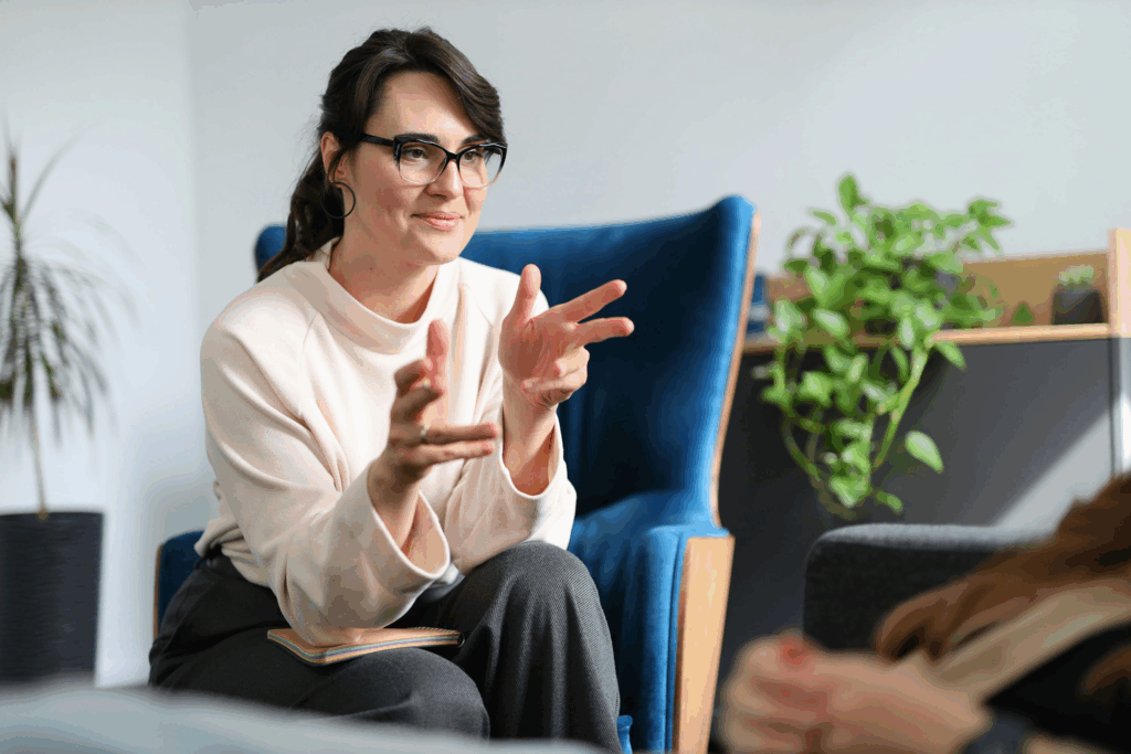 a therapist speaking to patient